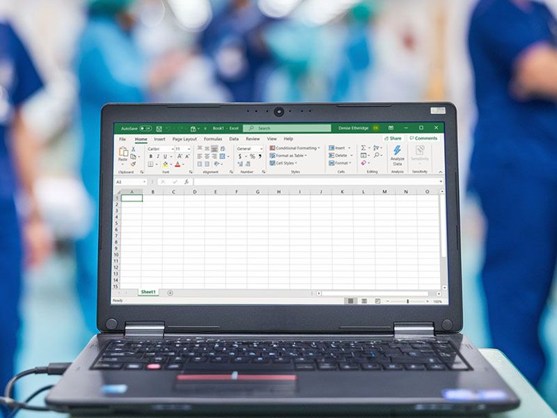 Laptop with excel spreadsheet