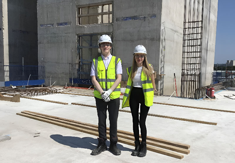 Toby Sherratt and Lily Canning on a site visit