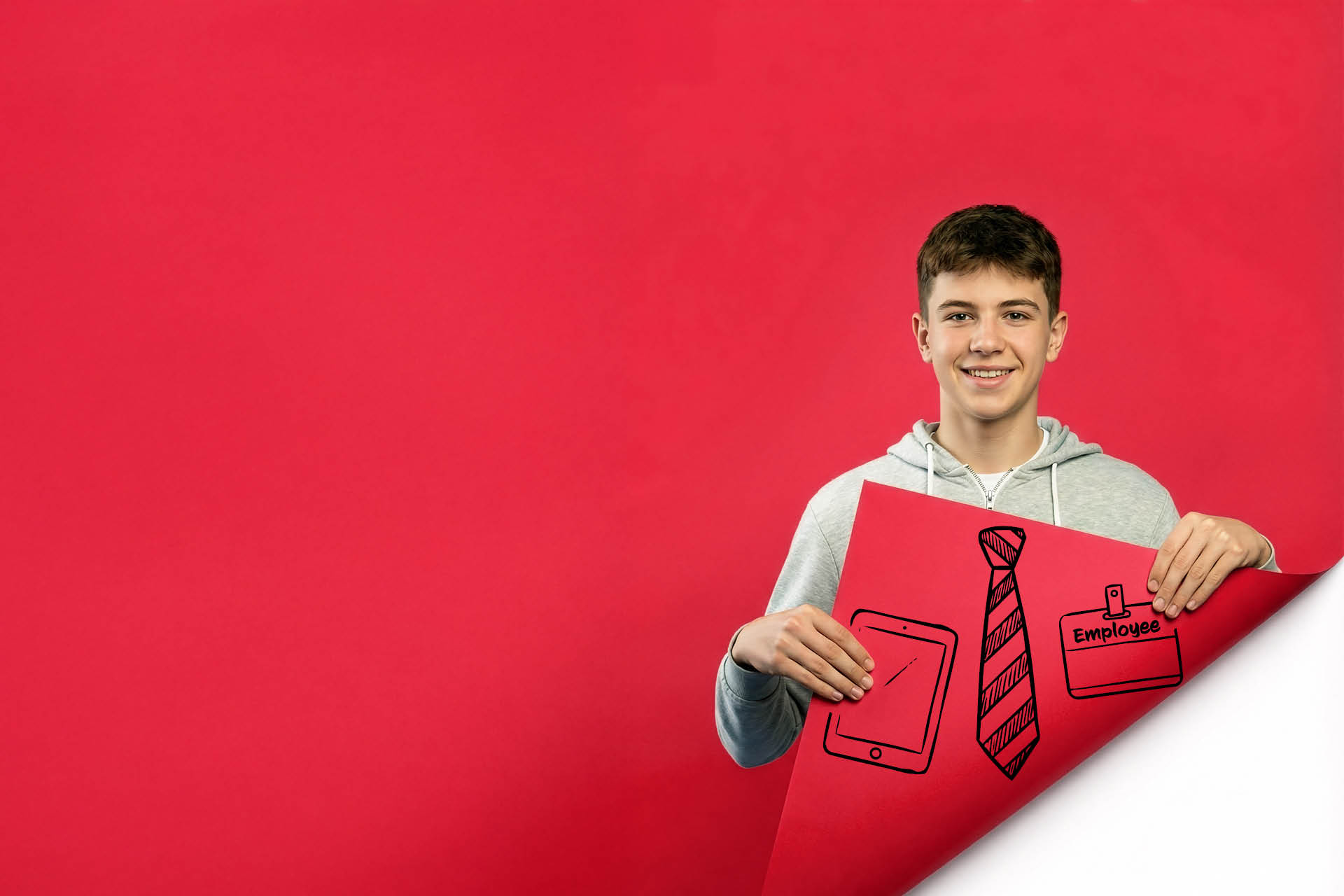 Boy lifting up a page to reveal career options