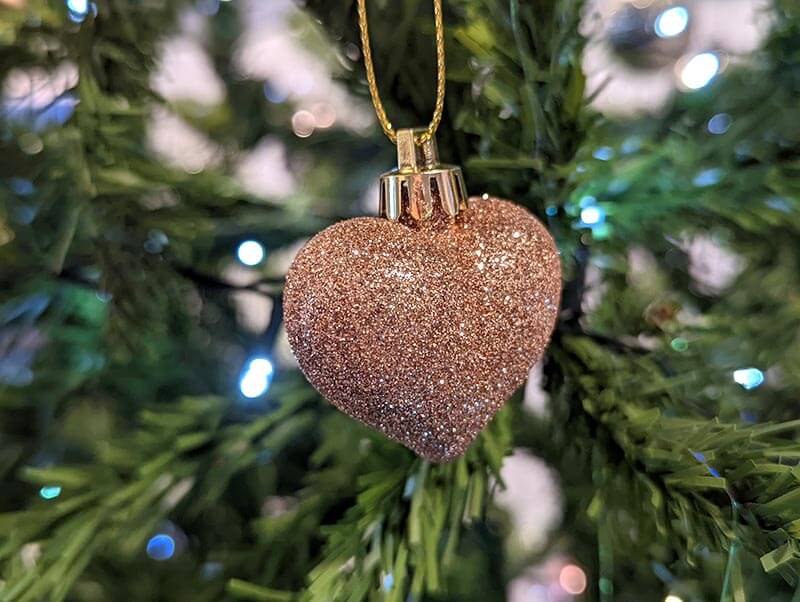 Heart shaped ornament on christmas tree