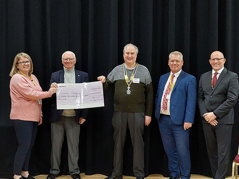 Newbury Rotary Club representatives present donation to Newbury College