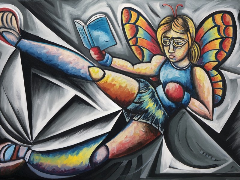 A female butterfly kickboxing and reading a book