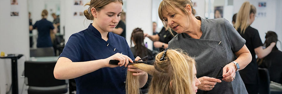 Student working the hair salon